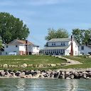 Shoreside Cottage viewed from the lake a few hundred yards from shore.